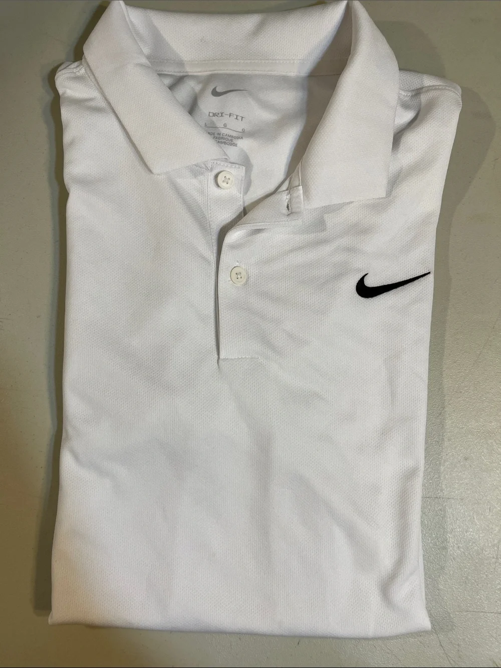 Nike White Polo with Black Swoosh